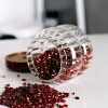 Creative coarse grain glass storage jar, hammer-patterned acacia wood lid sealed jar, coffee bean storage jar and storage bottle details Picture
